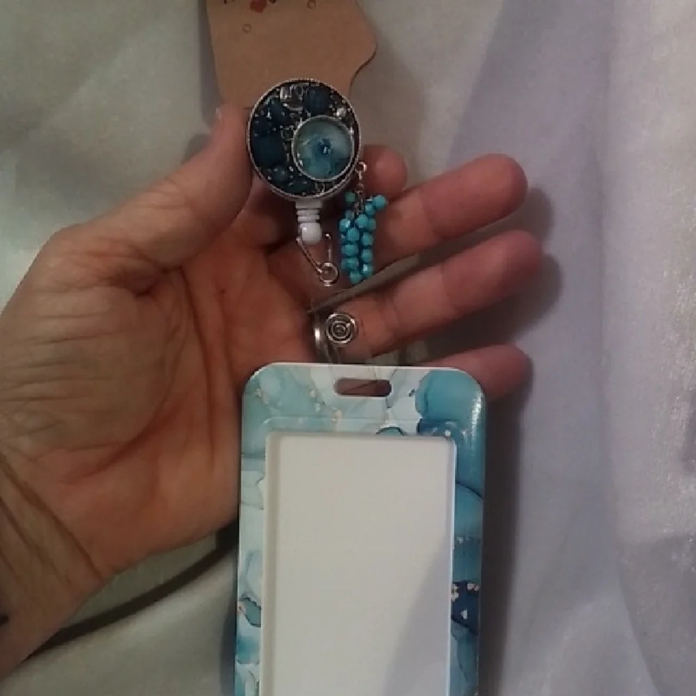 Turquoise Floral Badge Holder with Retractable Reel
